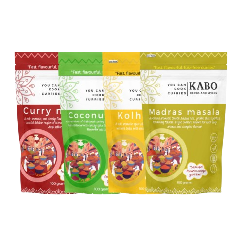 "Four packages of Kabo curry blends with colorful designs on a white background"